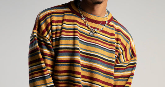 Pull en laine oversize à rayures multicolores DDP, pièce emblématique de la mode année 90