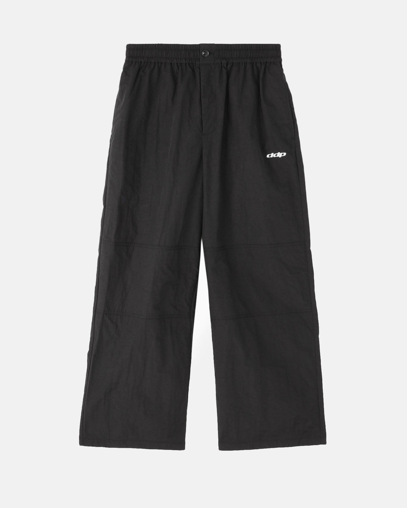 Pantalon DDP en nylon coupe skate, silhouette 90s